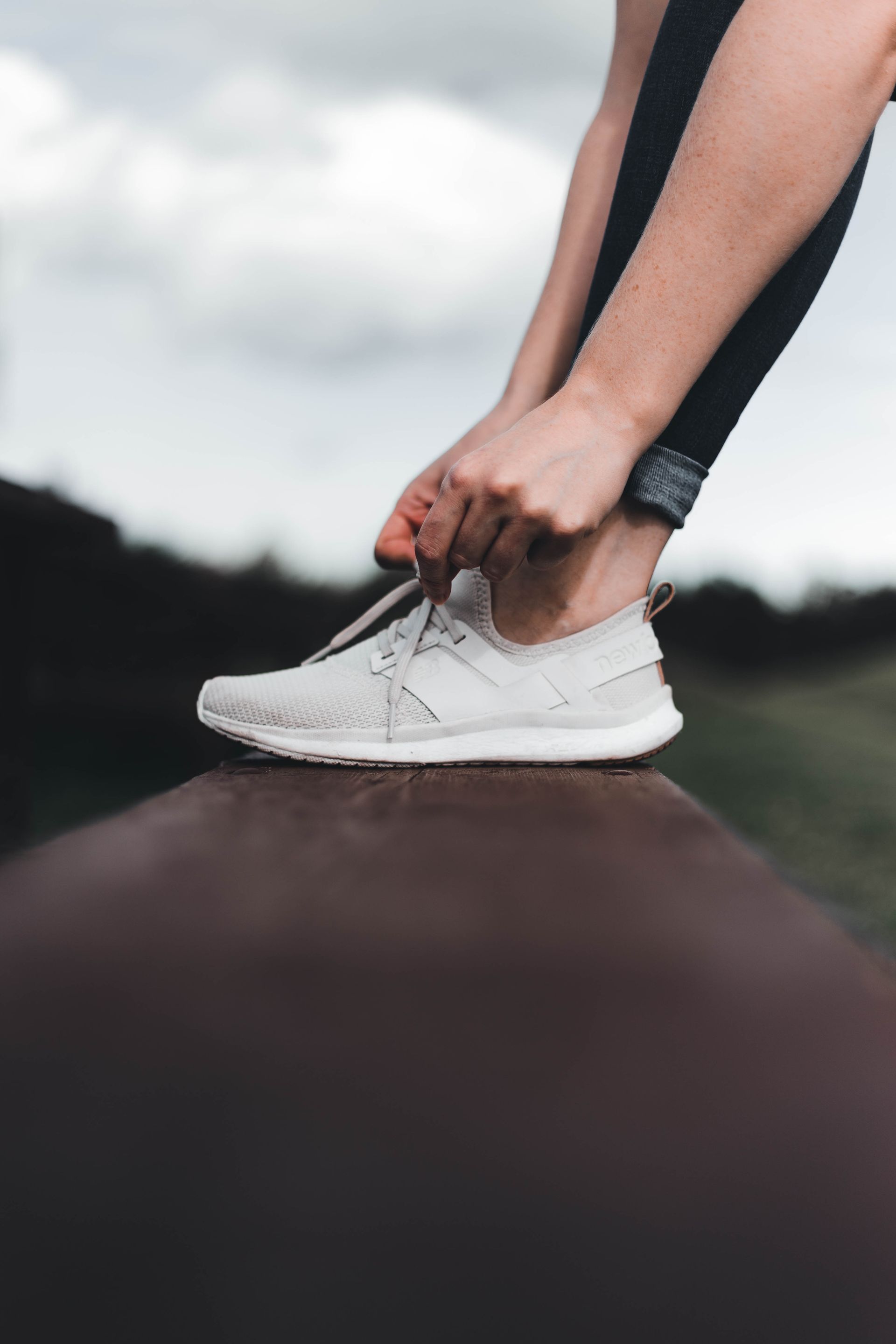 Tying trainers, ready to get moving